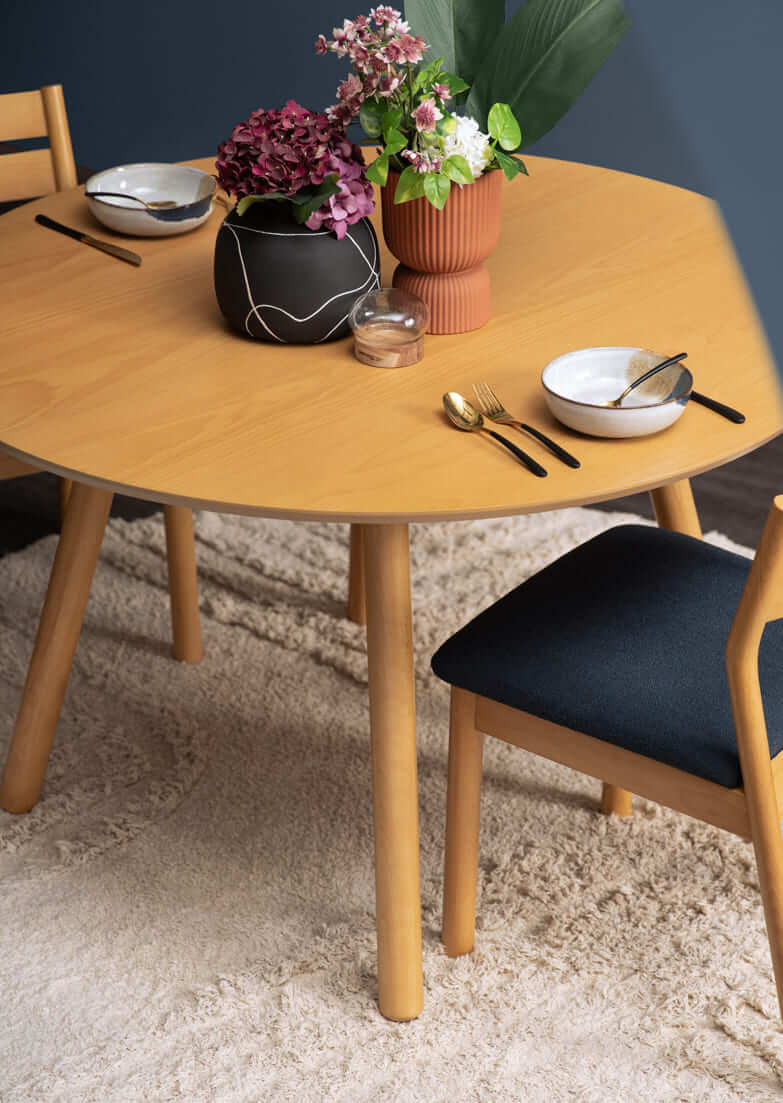 Styled dining setting featuring HINLIM furniture and tableware